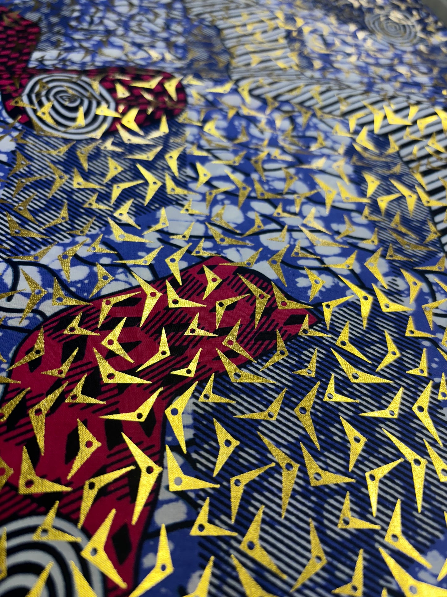 African print fabric with gold foil pattern