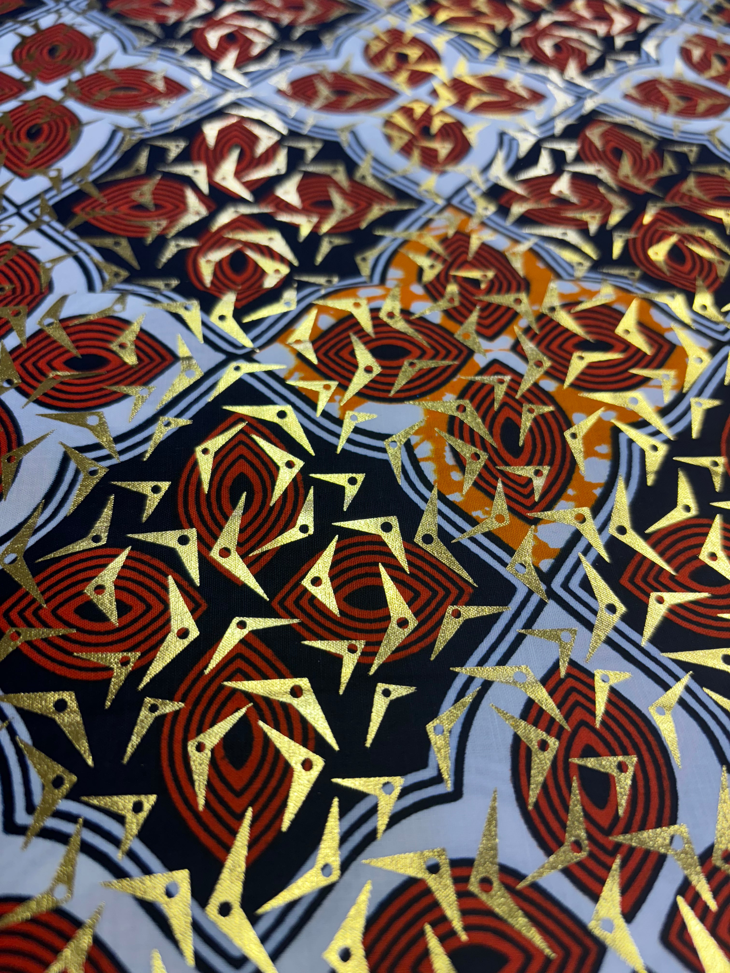 African print fabric with gold foil pattern